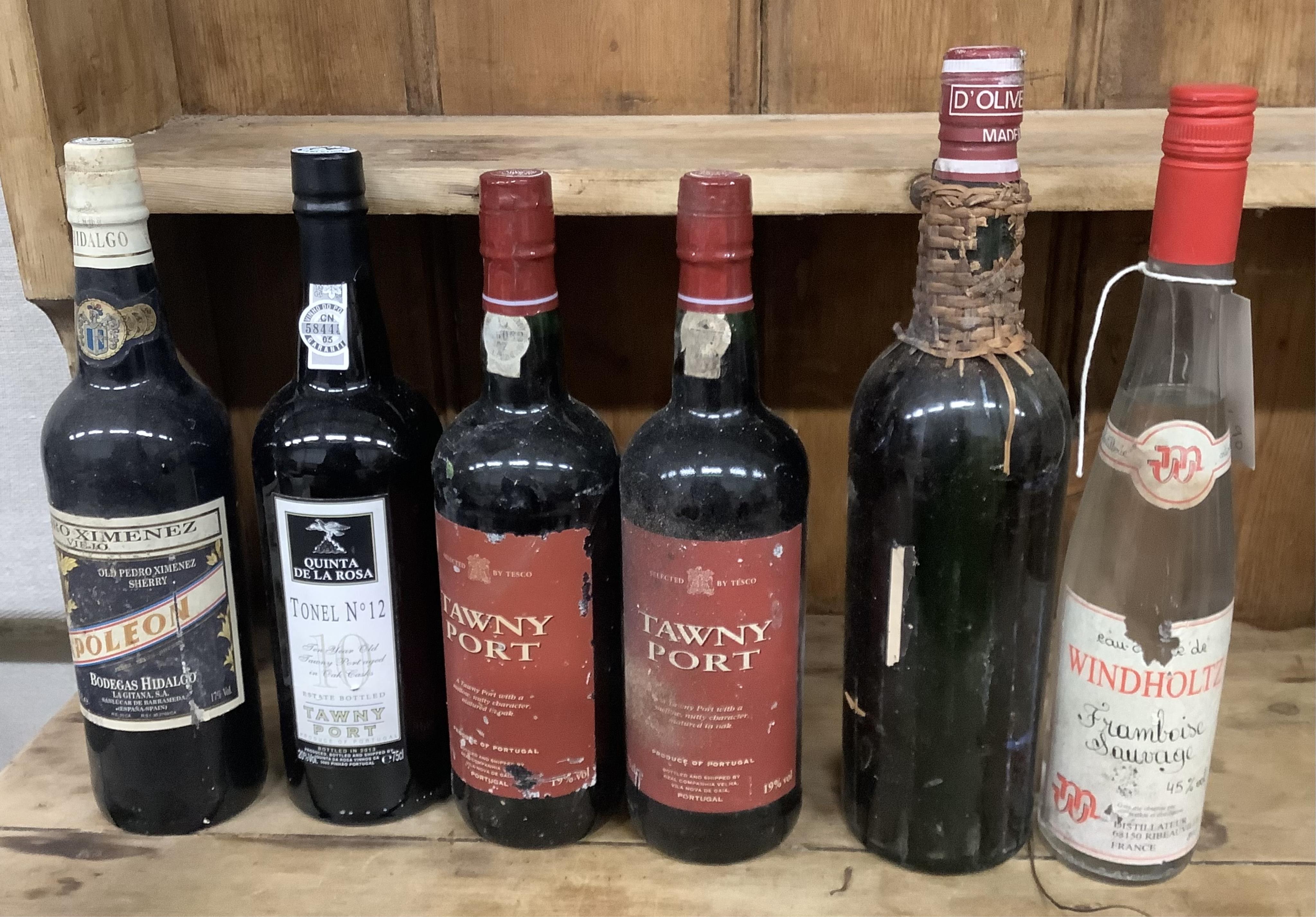 Three bottles of Tawny Port, a bottle of Napoleon Sherry, a bottle of D’Oliveiras Madeira and a bottle of Windholtz Framboise Sauvage Brandy (6). Condition - fair, from a local private cellar